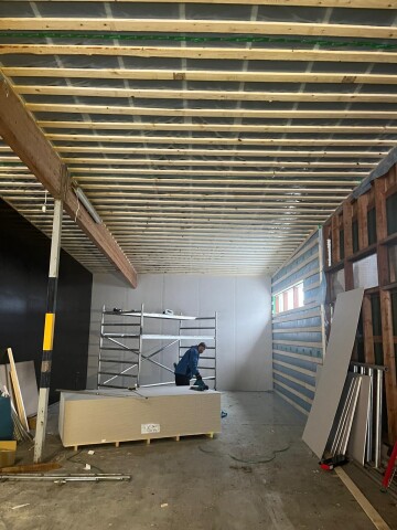 Insulated production facility walls